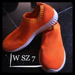 Neon orange walking sneaker
